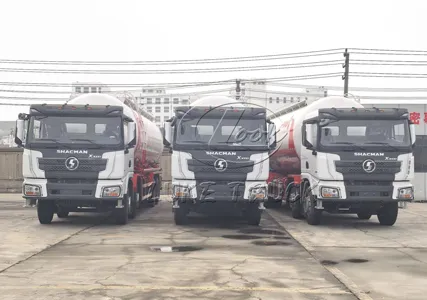 Batch Delivery of SHACMAN Delong Bulk Powder Tank Trucks at Khorgas Port