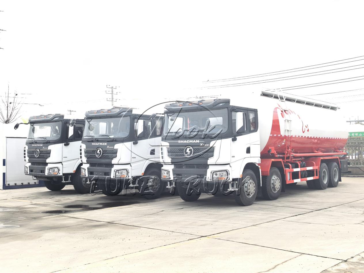 batch-delivery-of-shacman-delong-bulk-powder-tank-trucks-at-khorgas-port.jpg